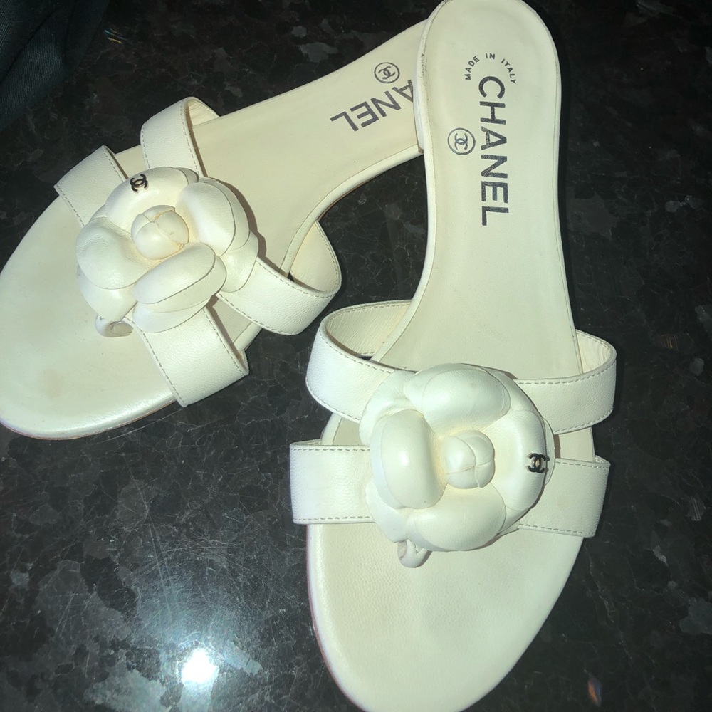 Chanel mules with rosettes